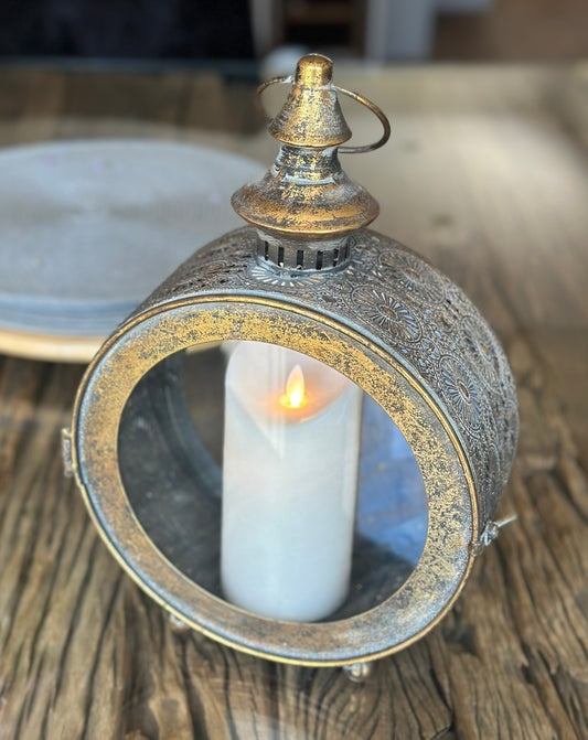 the lantern with gold design and door closed