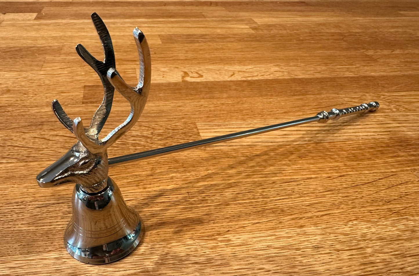 Luxury aluminium stag candle snuffer with silver design, elegant home accessory for extinguishing candles and stylish Christmas gift for modern homes.