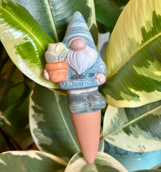 Ceramic gonk gnome plant waterer for slow watering and cute garden gift