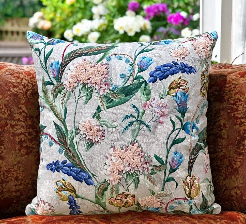 Decorative embroidered flower pillow with garden-inspired design on cotton fabric, perfect for adding a nature touch to home decor or as a thoughtful gift