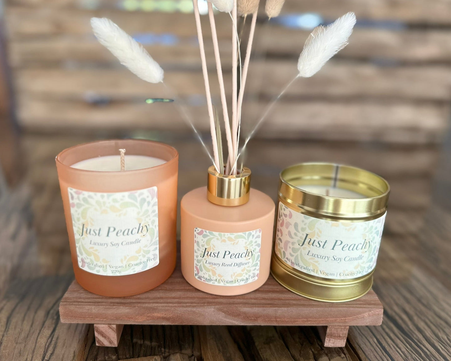 just peachy collection of candles and reed diffuser