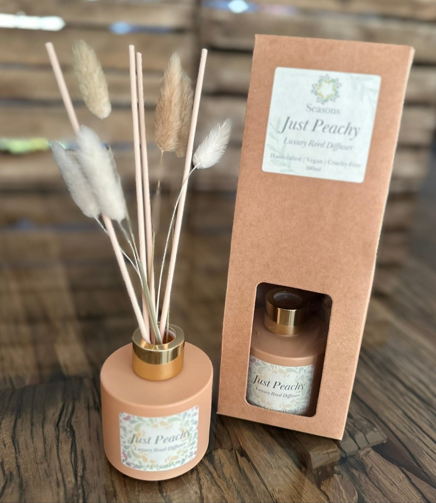 just peach reed diffuser, shown in and out of the packaging.