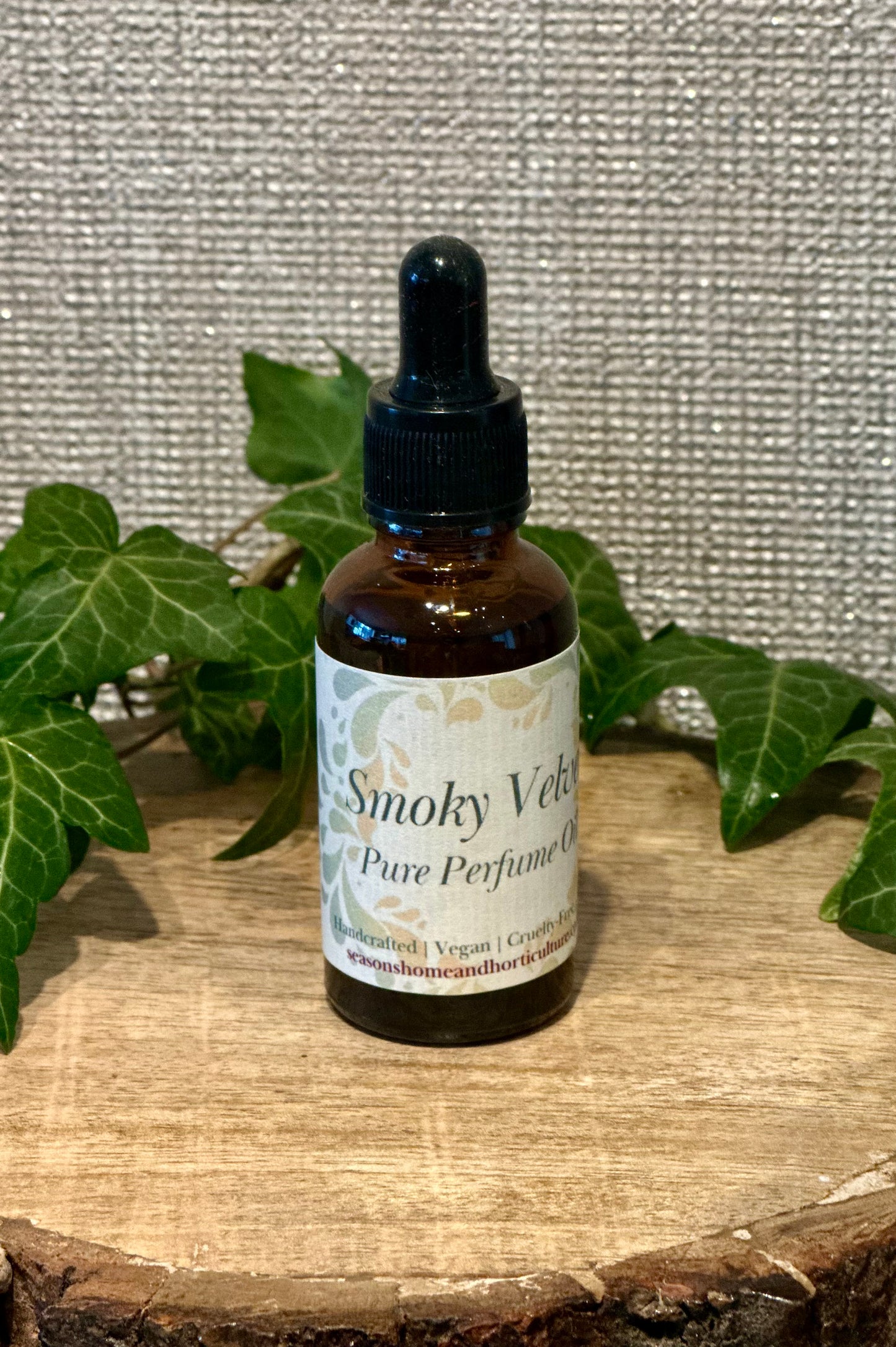 Smokey velvet perfume oil with pipette in a glass bottle, featuring honey, spices, and sandalwood notes designed for home fragrance and ambient scenting