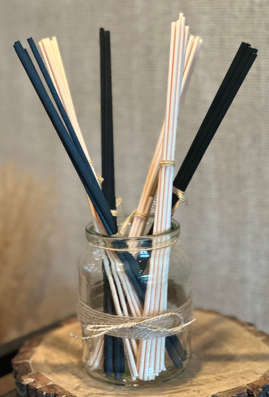 Rustic reed diffuser refills sticks, cream and black, in a jar. 