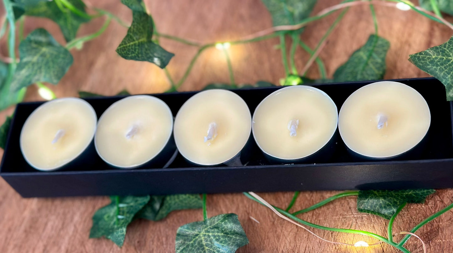 Hand-poured black tealight candles, paraben-free and vegan, elegant minimalist home fragrance gift set.