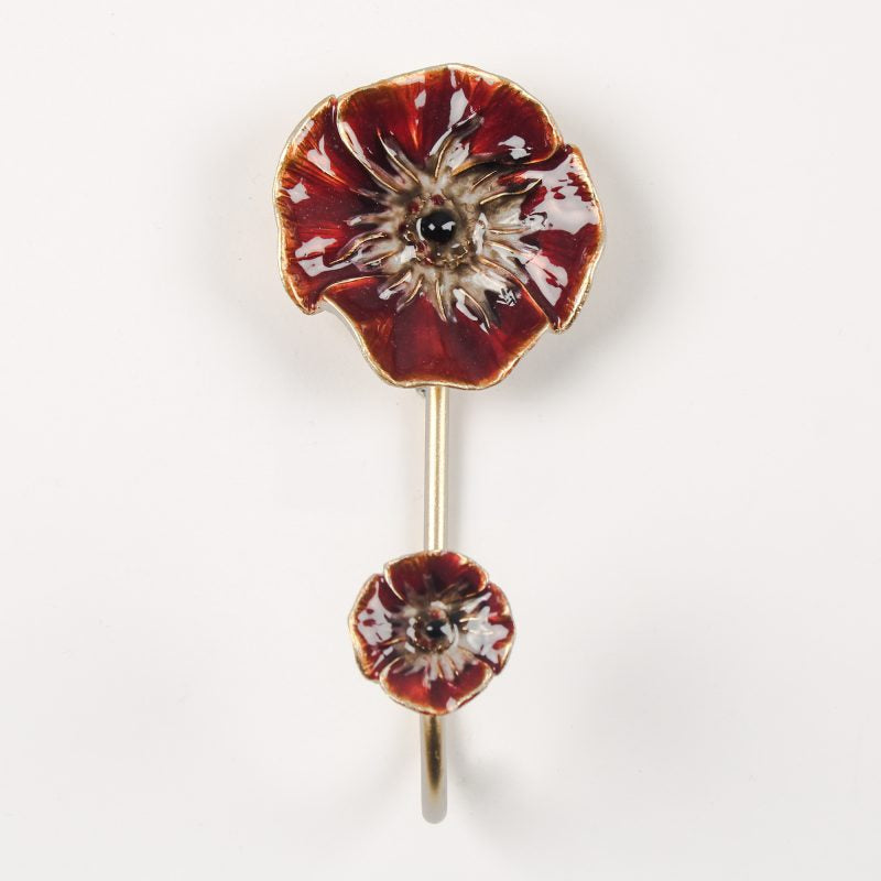 Brass and coloured enamel poppy coat hook with red floral design, vintage-style decorative wall hanger perfect for entryways or bedroom décor.
