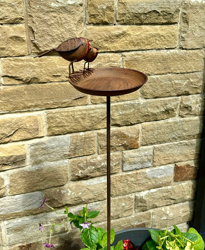 full imge of cast iron garden bird bath with two robins