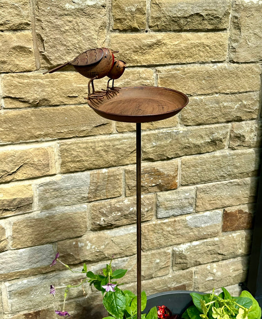 full imge of cast iron garden bird bath with two robins