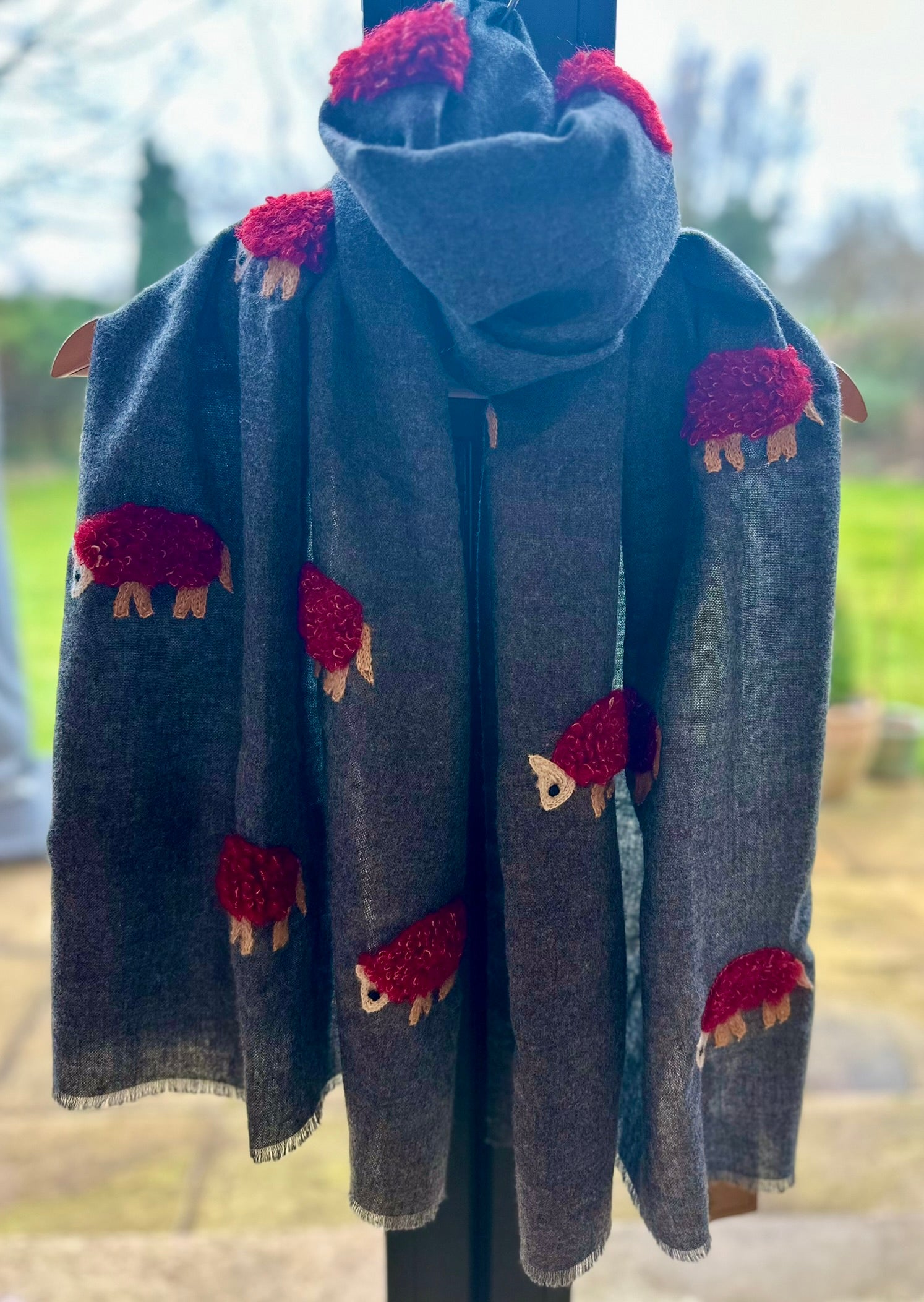 Charcoal grey wool scarf featuring red sheep embroidery, soft and stylish winter wrap, perfect fashion accessory or seasonal Christmas gift for women