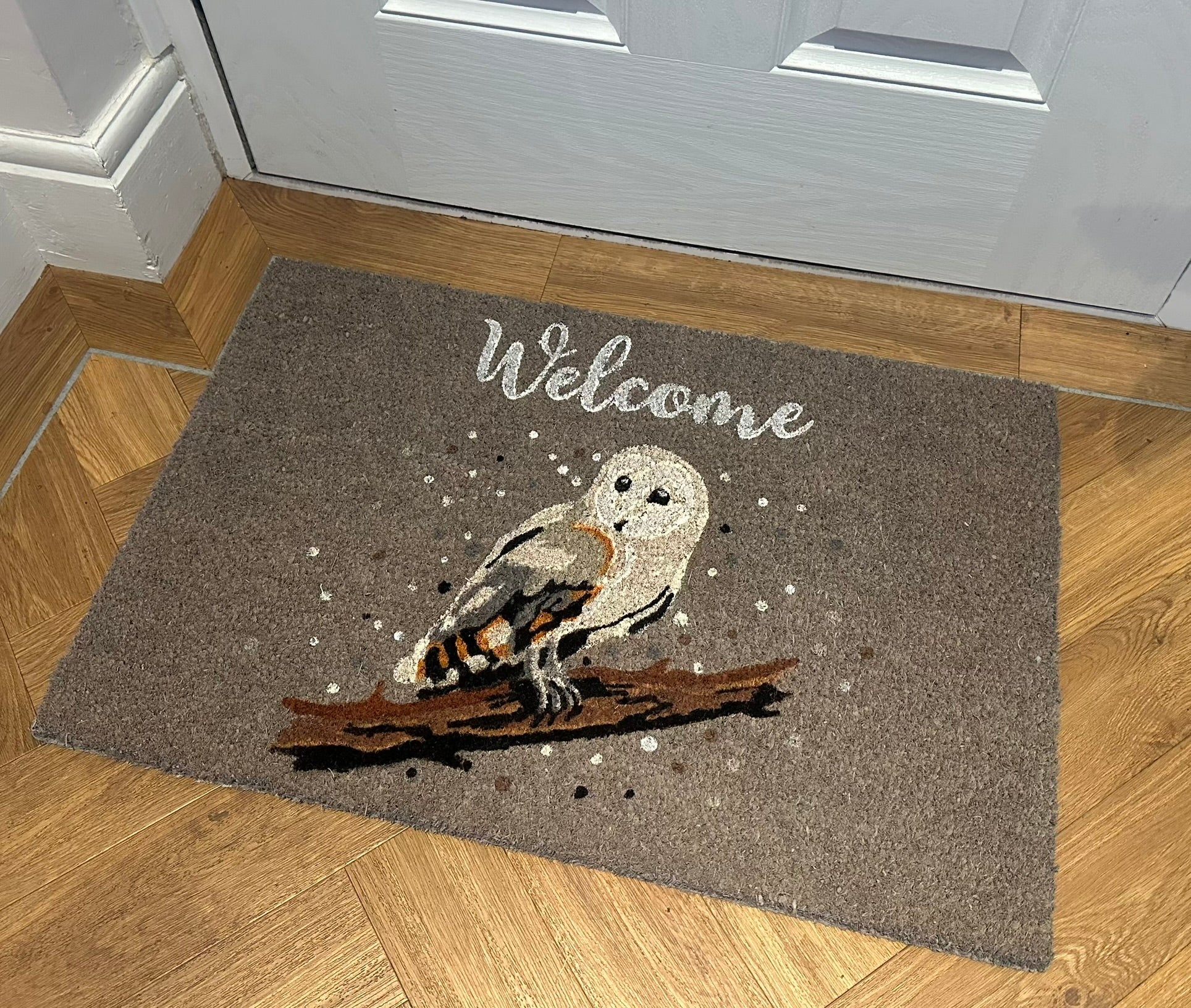 Festive grey coir fibre Christmas doormat with charming winter owl design, perfect eco-friendly holiday home décor and thoughtful Christmas gift for her.