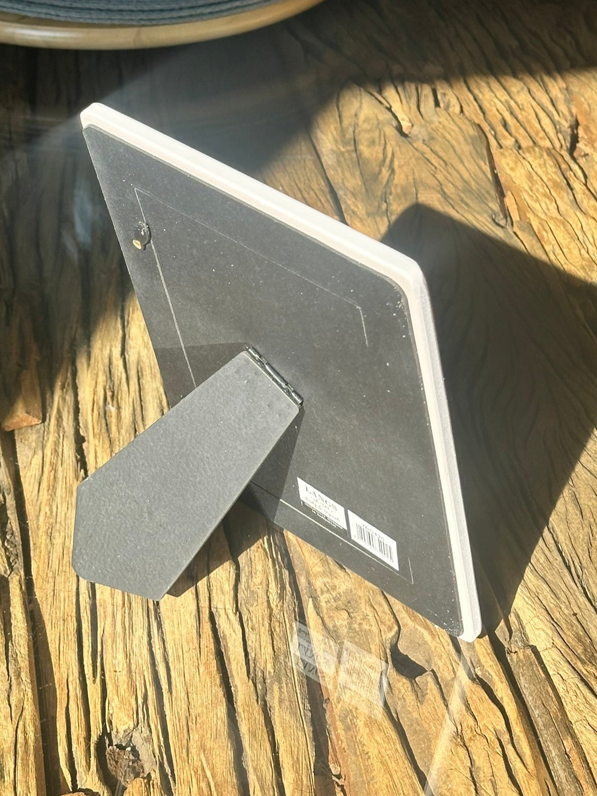 Decorative country-style picture frame with robin and wildflower artwork, ideal for displaying treasured memories