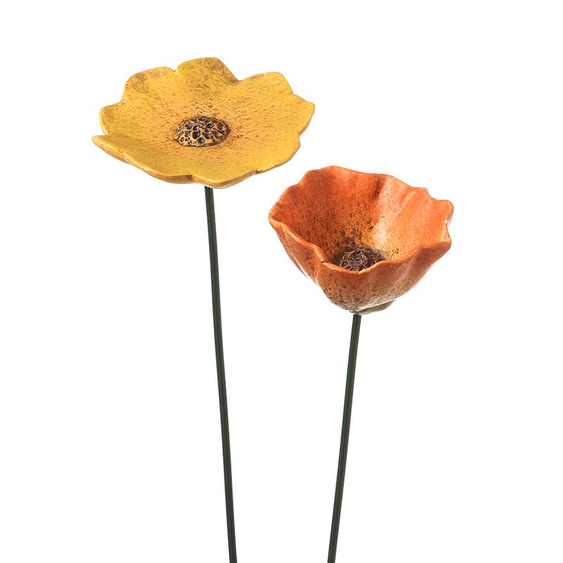 Two decorative flowers, one yellow and one orange, on a white background