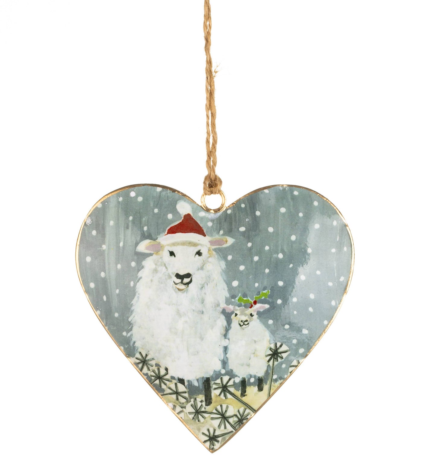 Heart-shaped ornament with sheep in santa hats in a snowy scene on a white background