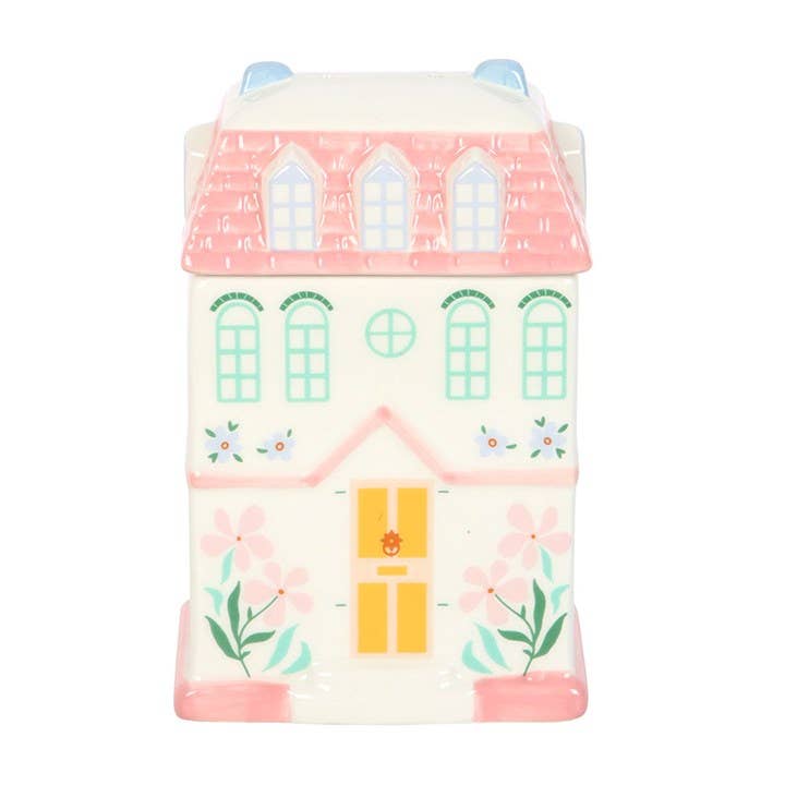 Cottage style house wax warmer with pastel colours and flower illustrations for home scenting and decoration