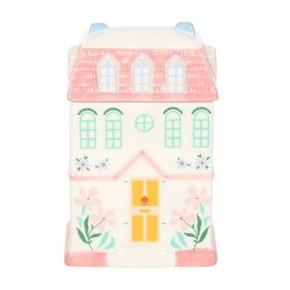 Cottage style house wax warmer with pastel colours and flower illustrations for home scenting and decoration