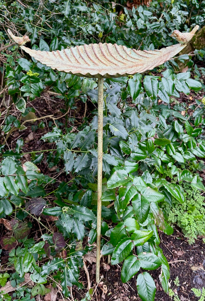 garden stake green rustic effect green foliage background