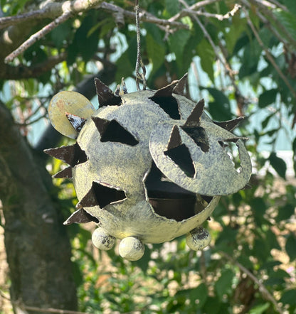 garden decoration hedgehog tealight holder hanging from branch
