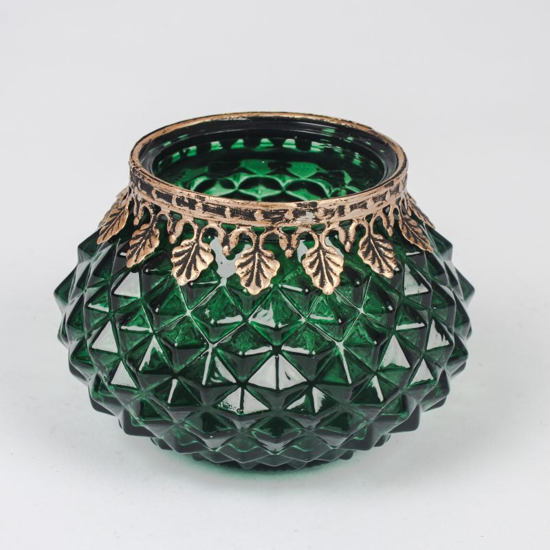Geometric green glass tealight holder with gold detail, modern candle holder for elegant home décor, ideal for table displays and cosy lighting.