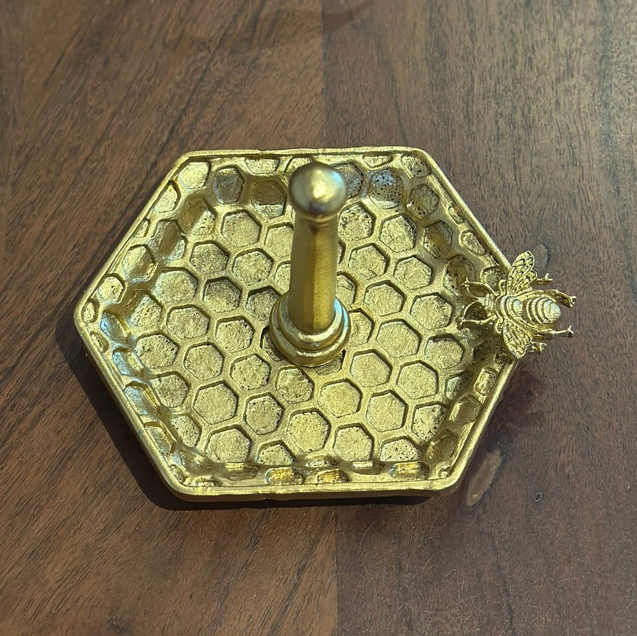 Gold honeycomb ring holder with bee detail — hexagon trinket dish and jewellery stand, ideal for elegant home decor or gifting.