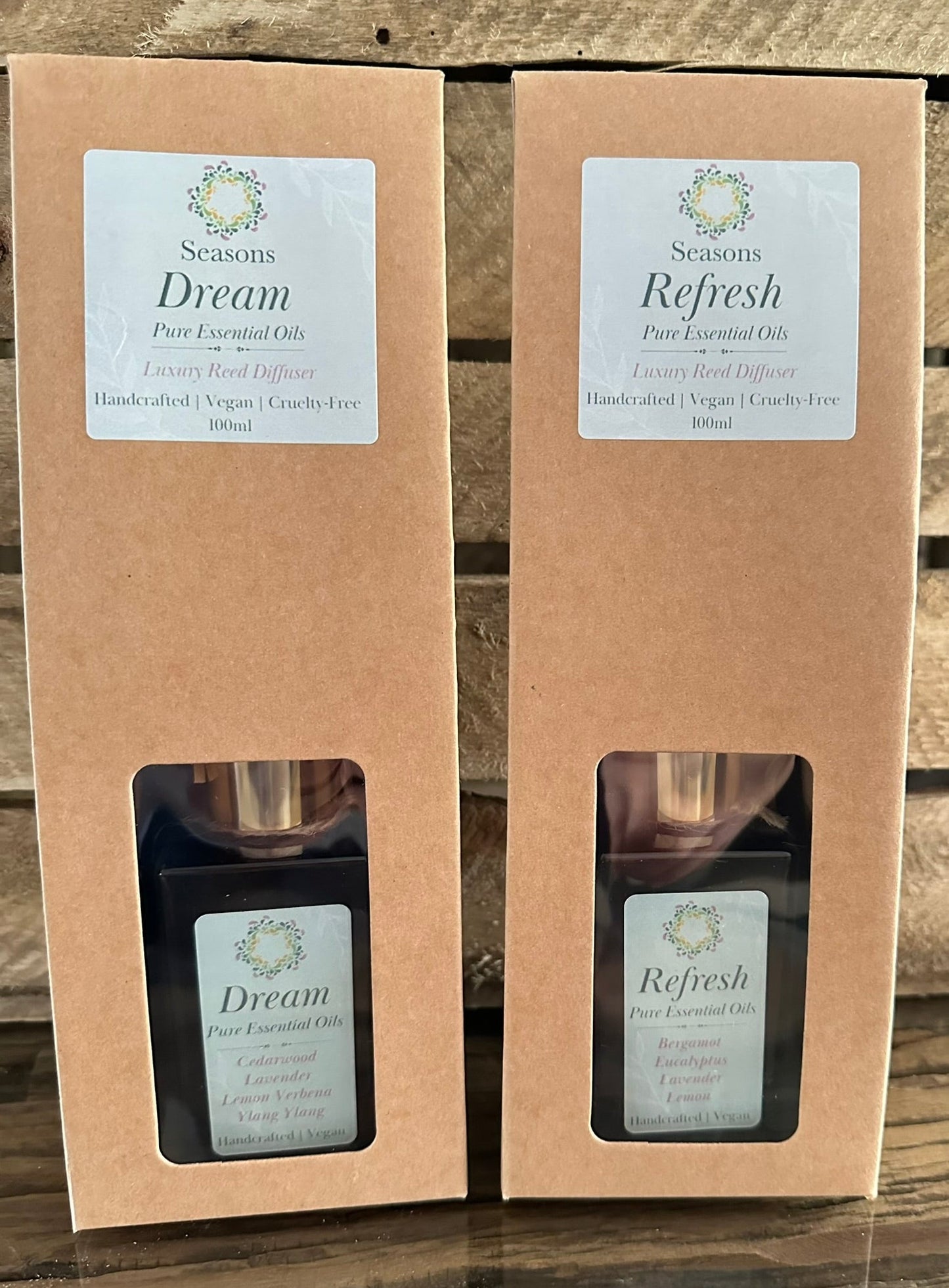 both reed diffusers in the packaging example. 