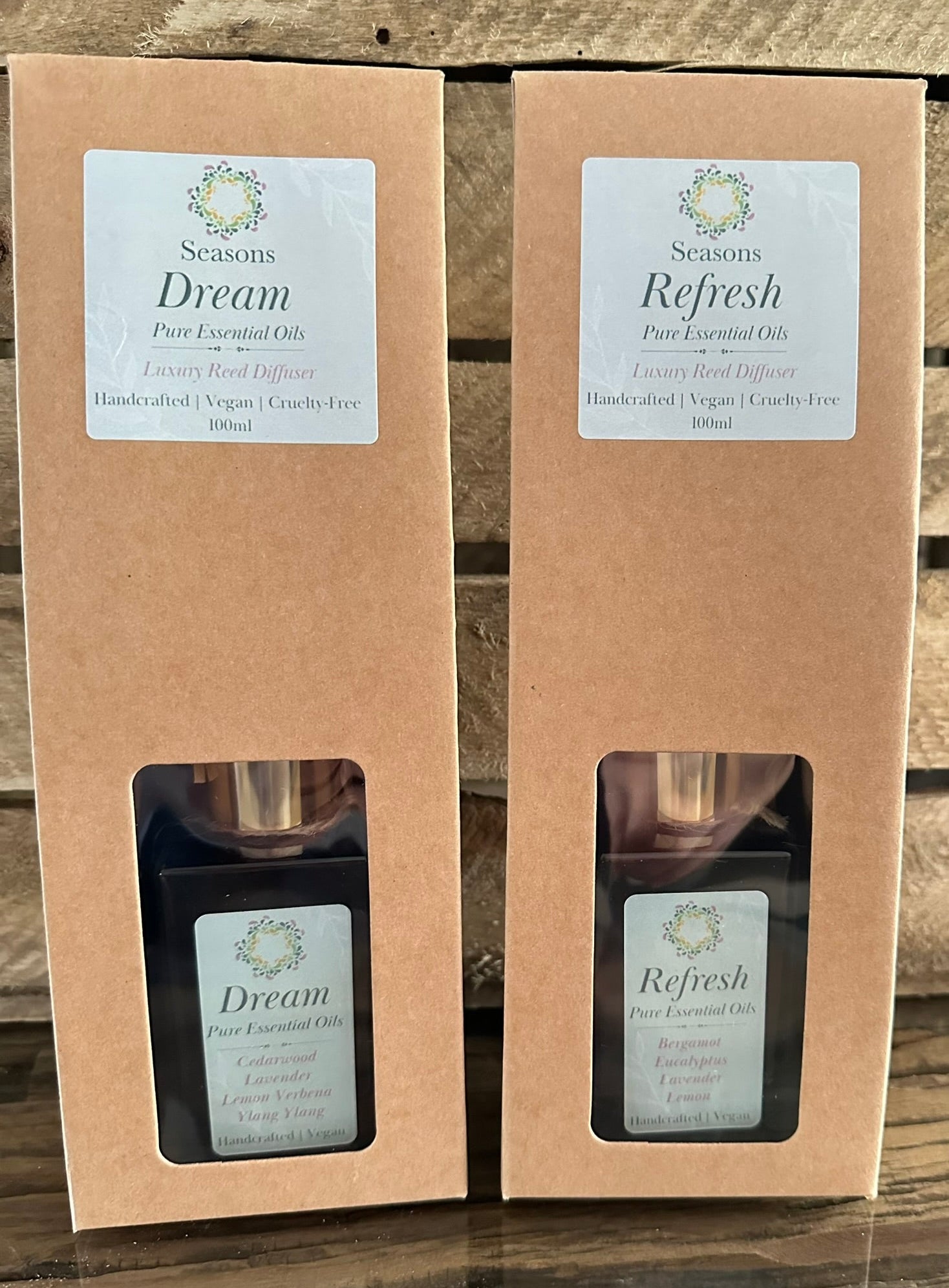 both reed diffusers in the packaging example. 
