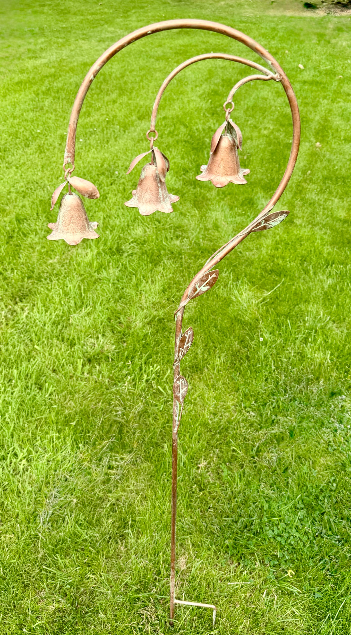 Weatherproof flower bell garden decoration adding charm and movement to outdoor spaces