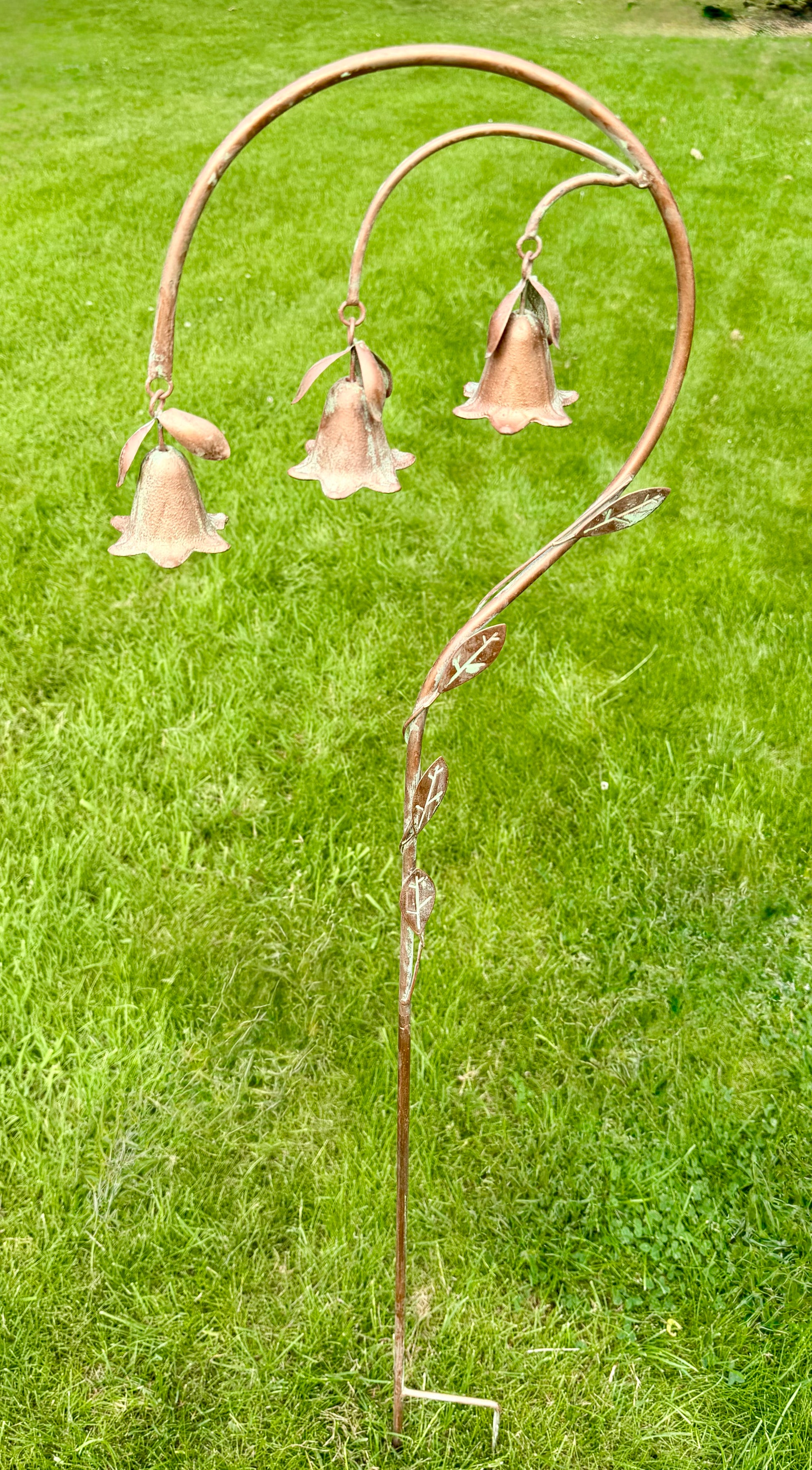 Weatherproof flower bell garden decoration adding charm and movement to outdoor spaces