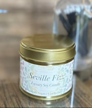 seville fizz tin candle, with lid on