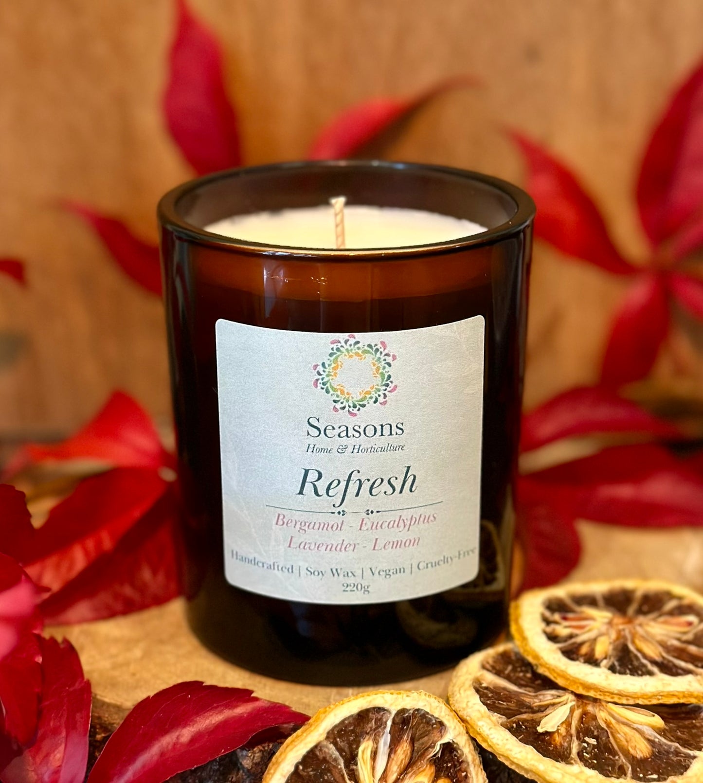 Refresh candle with lavender, citrus, and bergamot essential oils, vegan cruelty-free uplifting soy wax home fragrance.