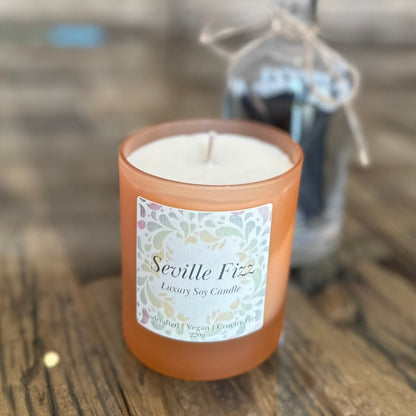 seville fizz candle in frosted glass peach jar