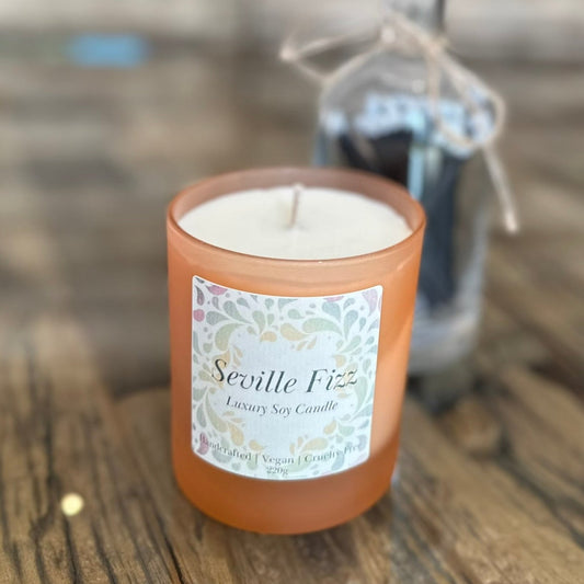 seville fizz candle in frosted glass peach jar