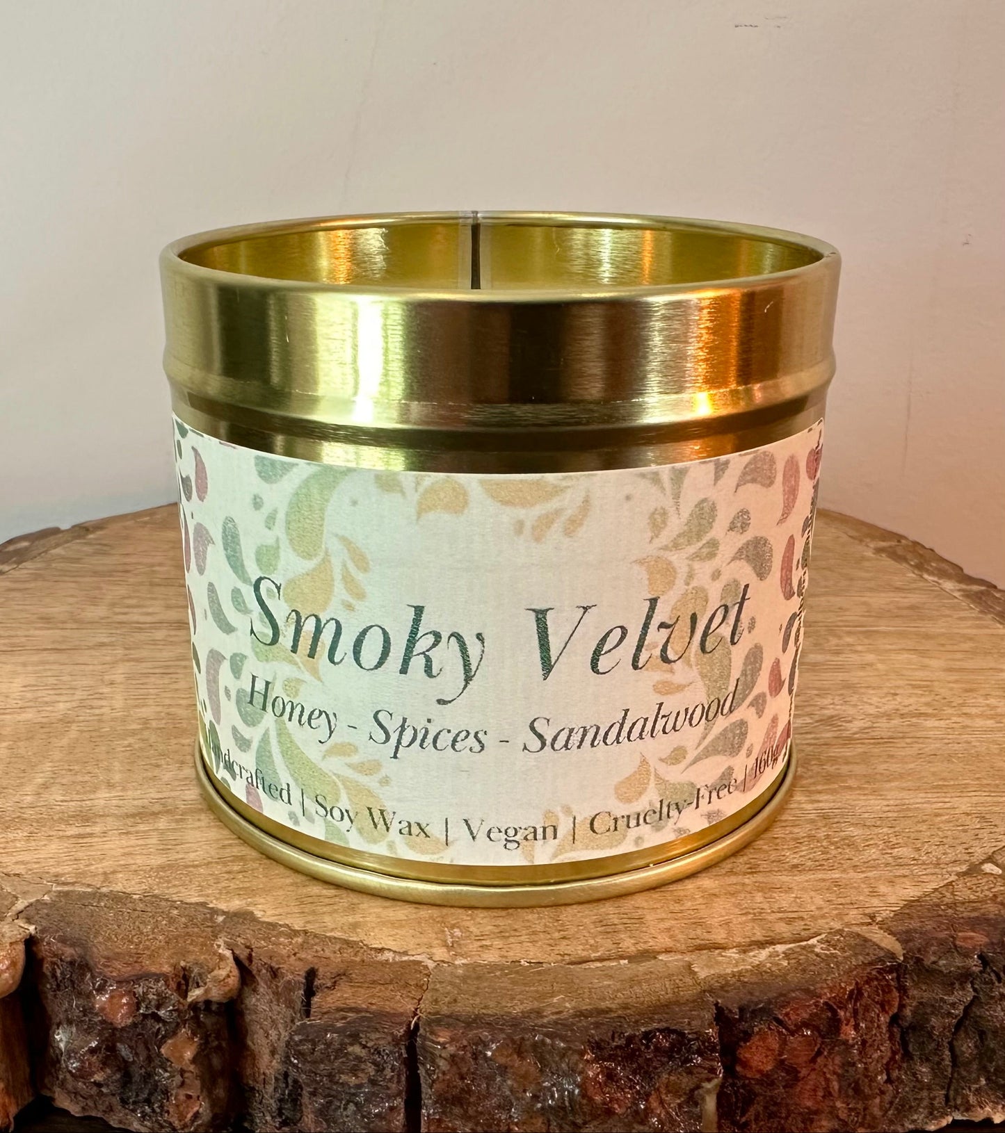 Smokey Velvet soy candle with honey, sandalwood and warm spice fragrance in gold tin handmade luxury home fragrance gift