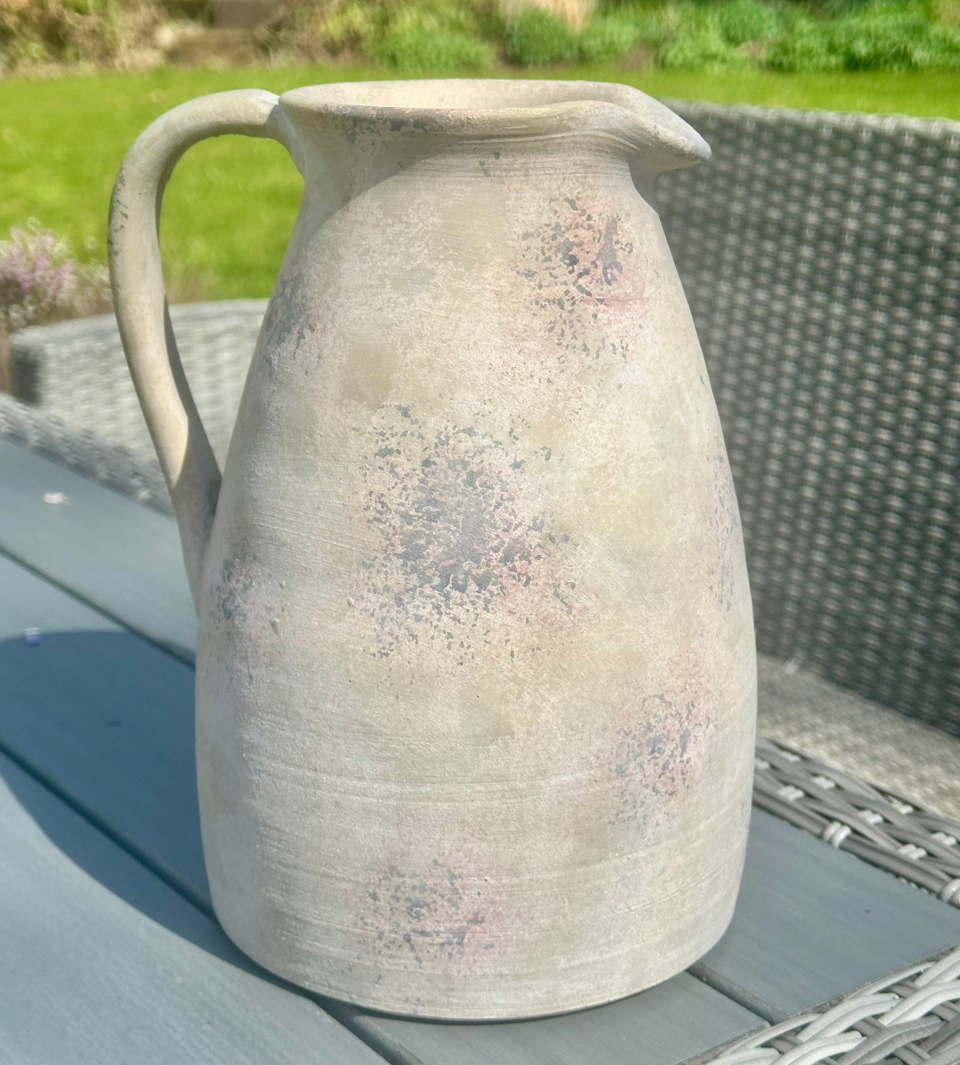 a large stoneware vase jug