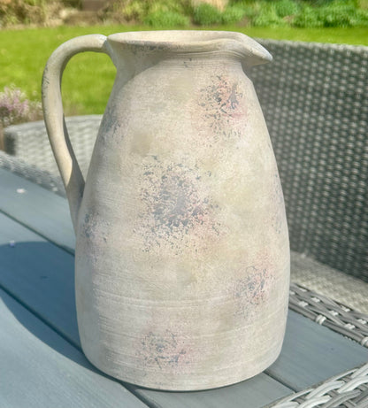 a large stoneware vase jug