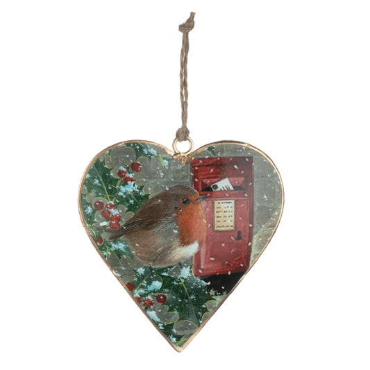 Heart-shaped Christmas ornament featuring a robin bird and a red post box on a snowy green background, with a gold hanging loop at the top.
