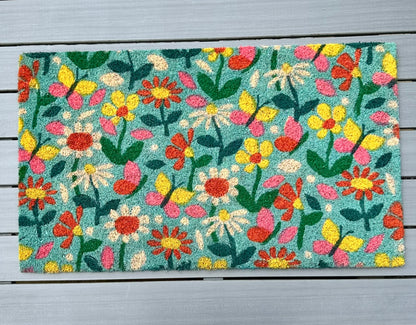 full view of the floral doormat