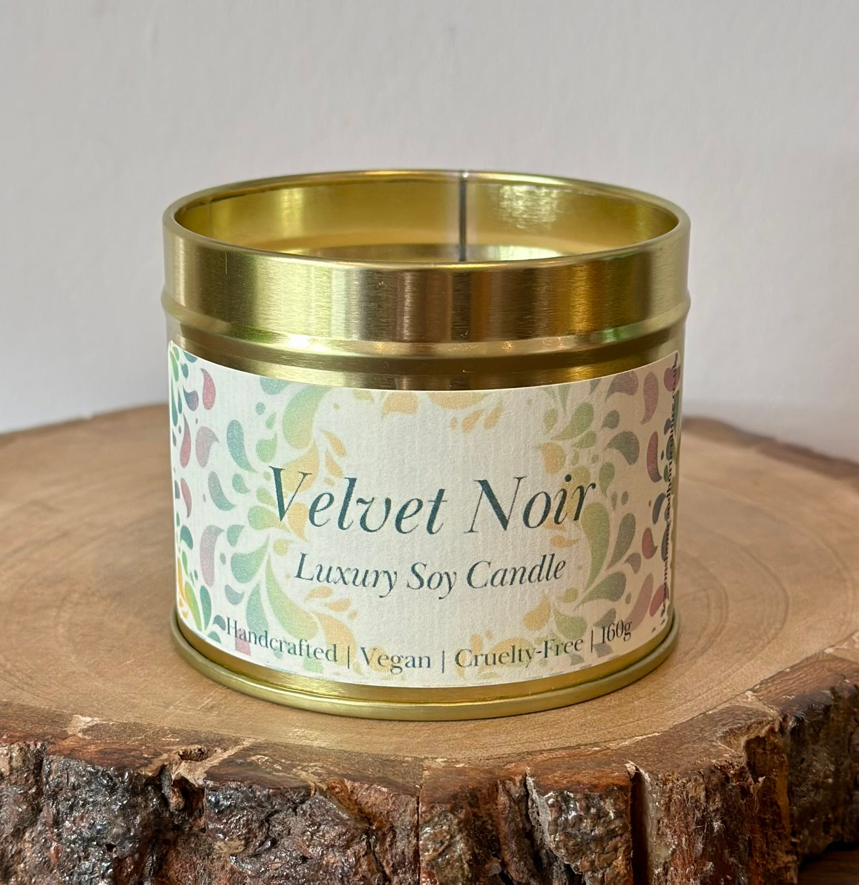 Luxury Velvet Noir soy candle with bergamot, vetiver, and tonka scent, vegan and cruelty-free handcrafted home fragrance gift.