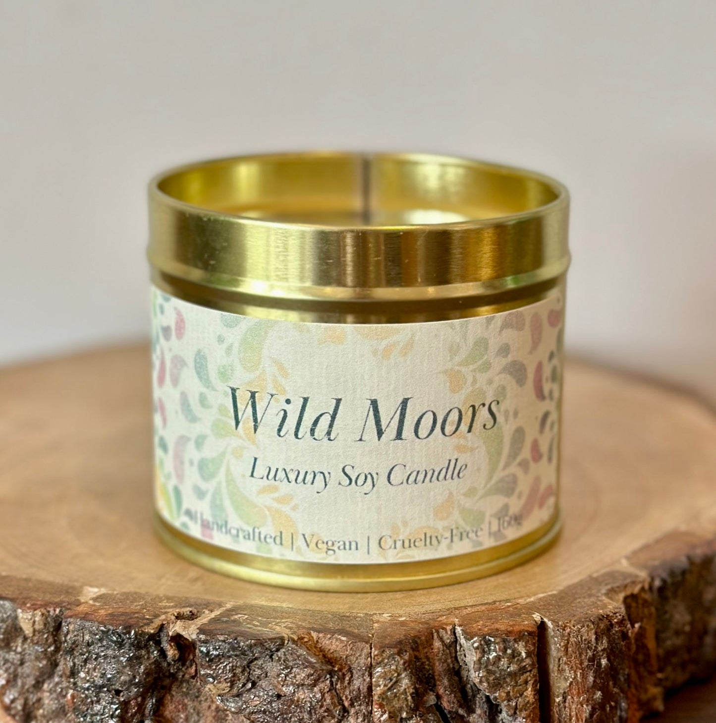 Wild Moors luxury soy candle tin with bergamot, amber and cedarwood scent, vegan cruelty-free paraben-free eco-friendly home fragrance