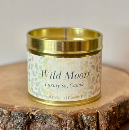 Wild Moors luxury soy candle tin with bergamot, amber and cedarwood scent, vegan cruelty-free paraben-free eco-friendly home fragrance