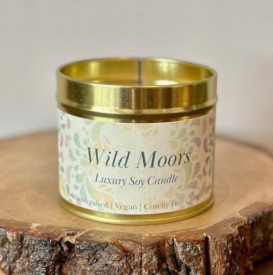 Wild Moors luxury soy candle tin with bergamot, amber and cedarwood scent, vegan cruelty-free paraben-free eco-friendly home fragrance