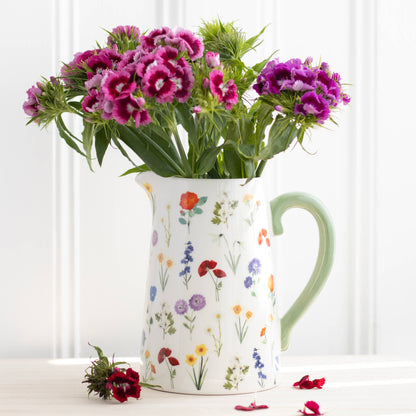 wildflower Floral-patterned pitcher with pink red yellow flowers on a white background