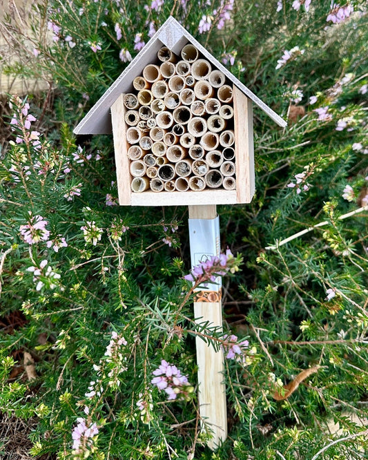a wooden insect hotel