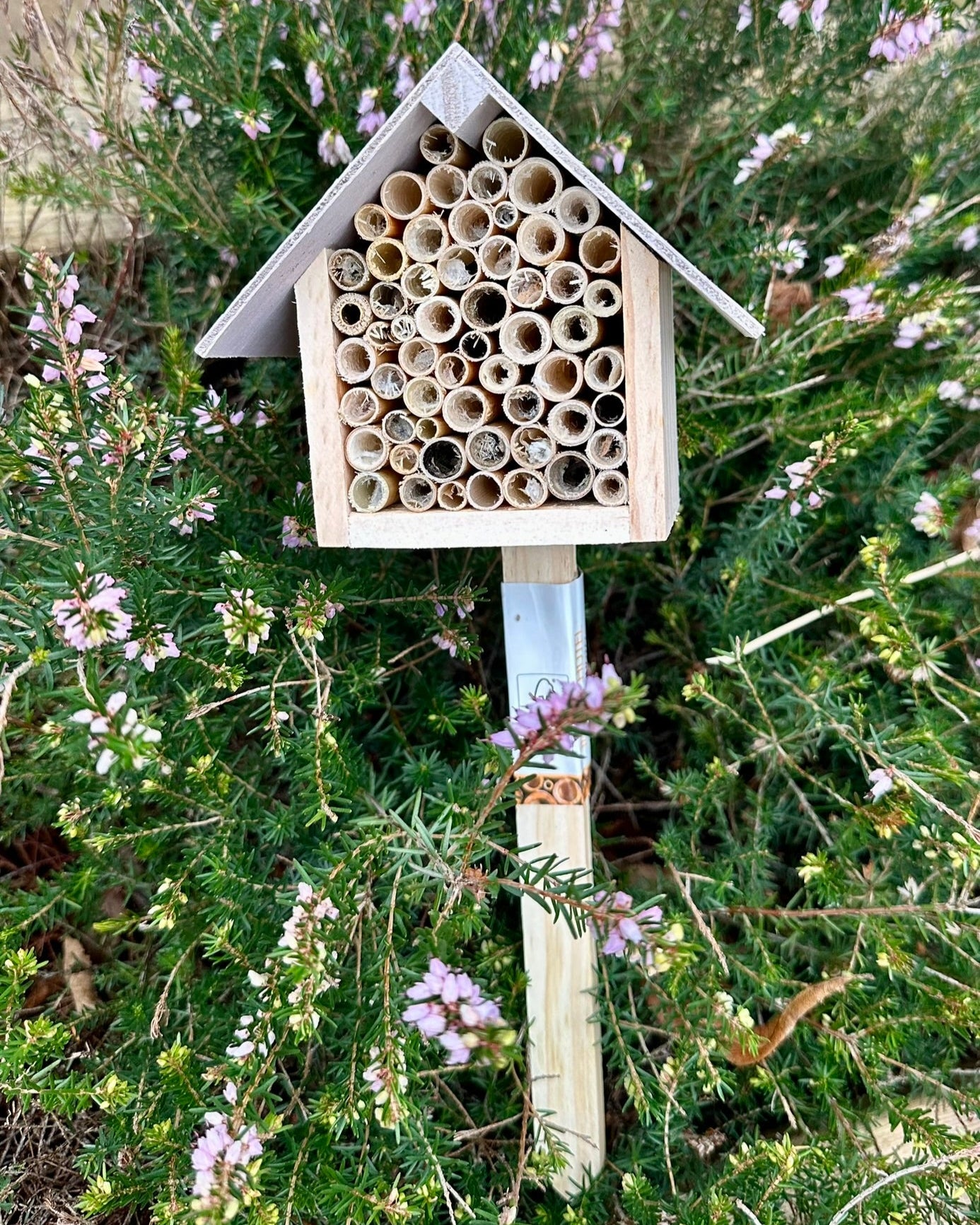 a wooden insect hotel
